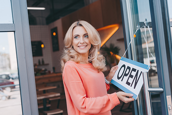 Shop owner signals she is open for business